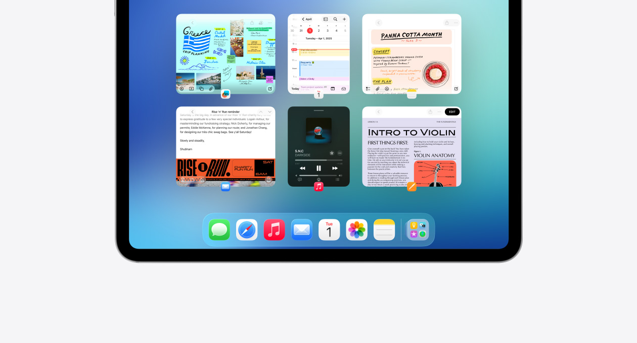 iPad i vandret position med seks åbne vinduer i to rækker, inklusive Kalender, Noter, Apple Music og Safari